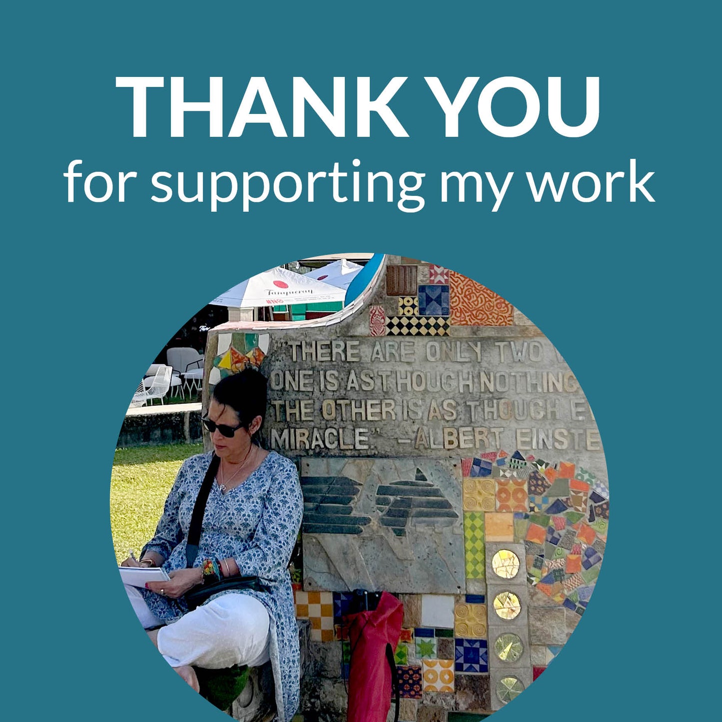 Me drawing at a festival in eSwatini saying thank you for supporting my work