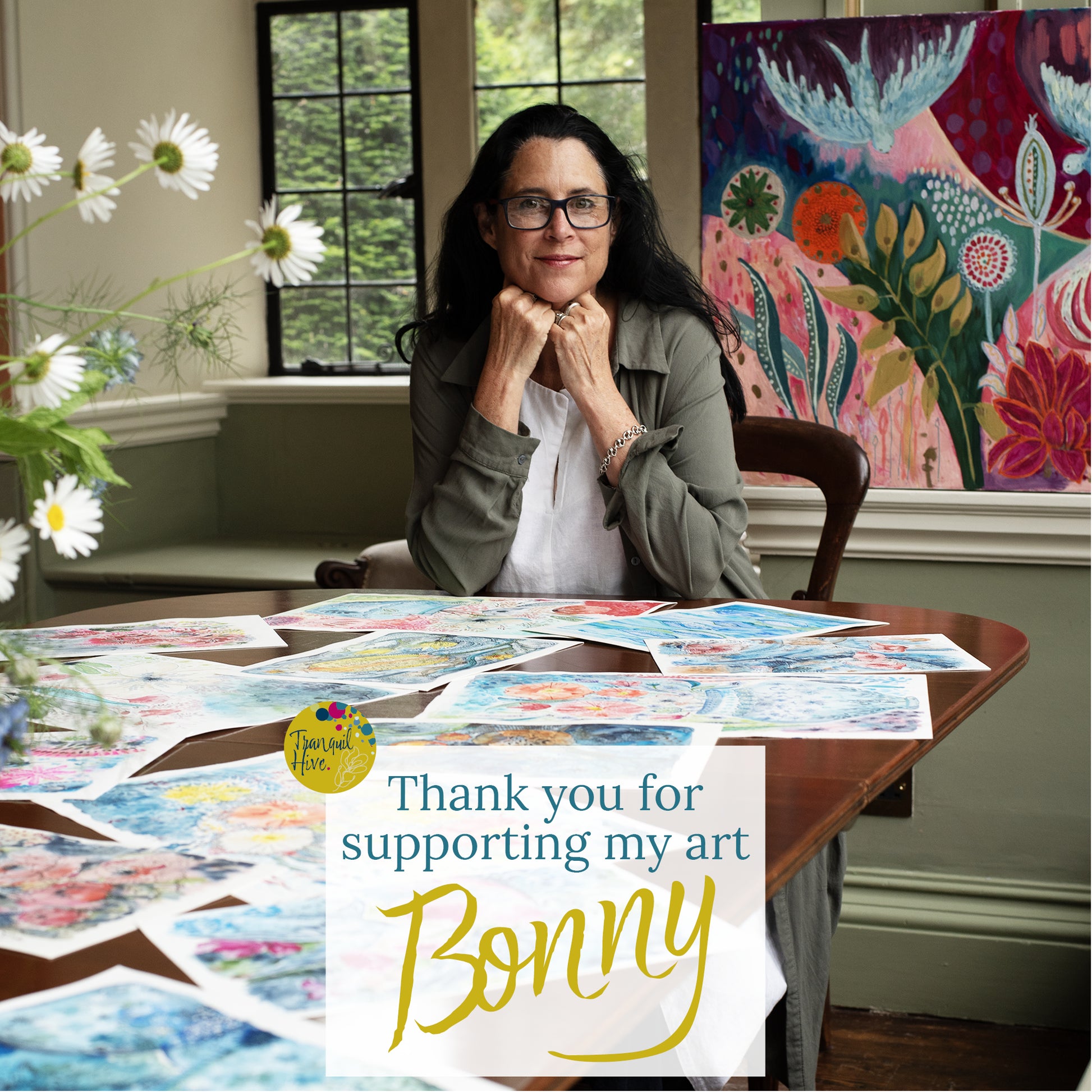 a photo of Bonny Jennings surrounded by my art with a thank you message.